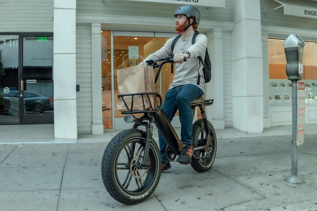 man in white jacket riding on black motorcycle