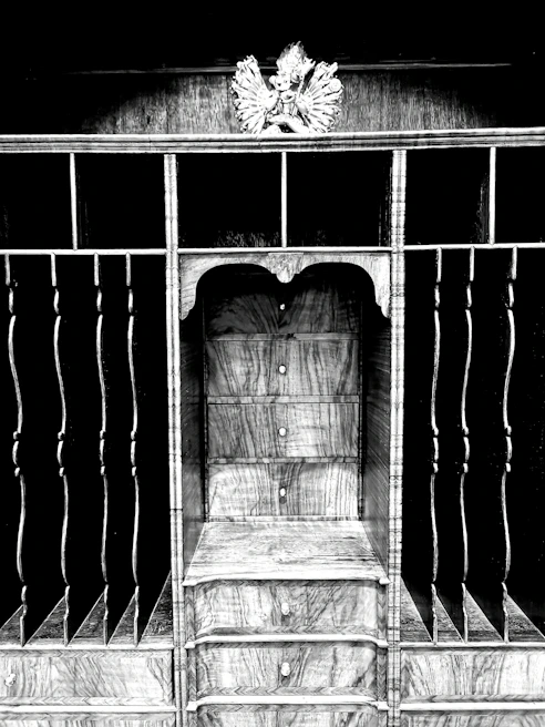 Custom-designed interior furniture piece blending wood and metal elements.