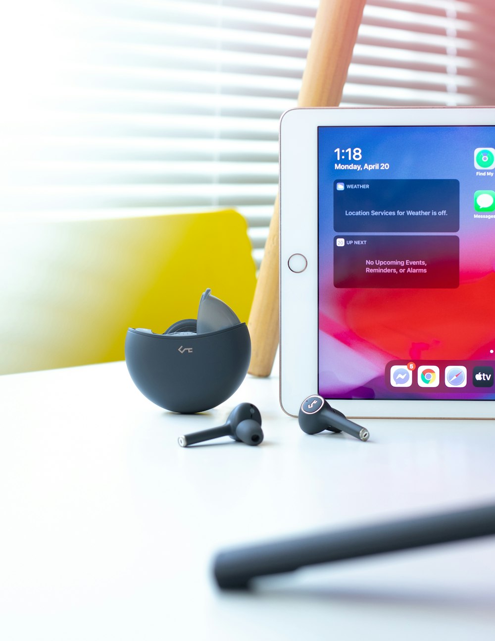 black and silver apple watch on white table