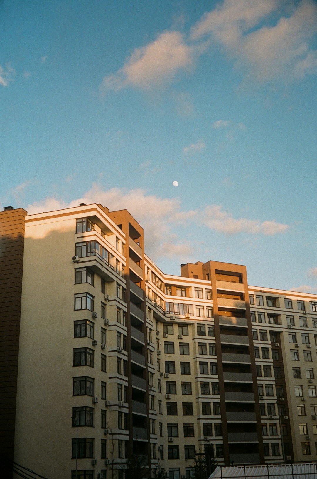 brown concrete building under blue sky during daytime