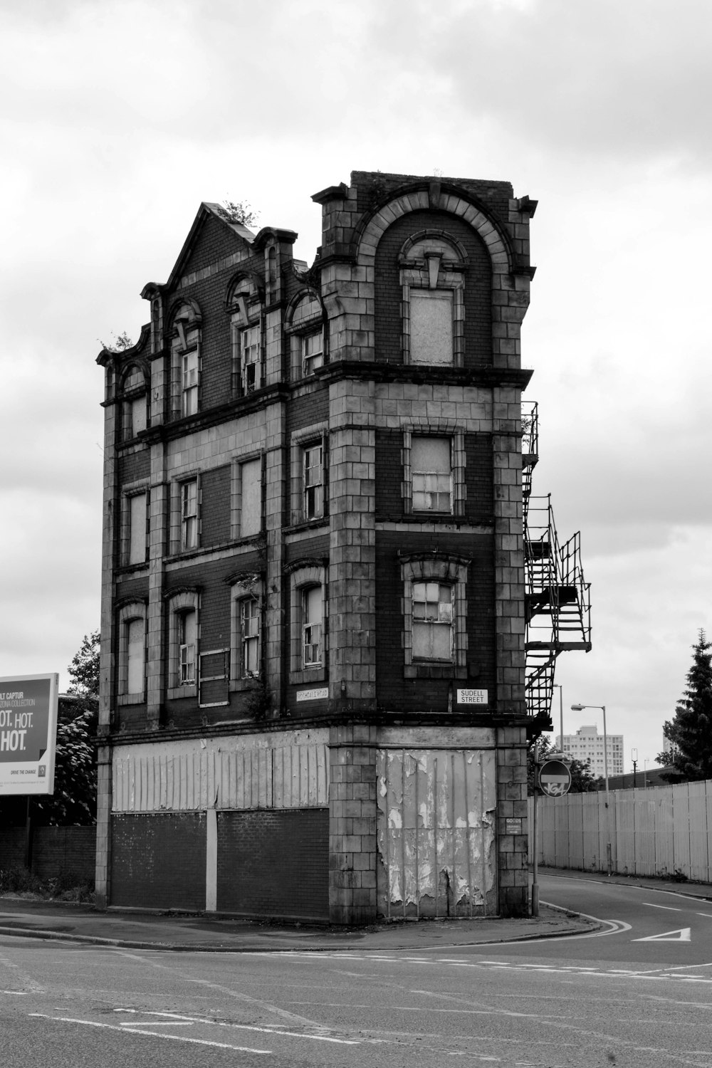 grayscale photo of concrete building