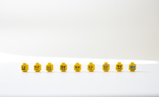 yellow and white round plastic toy