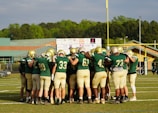 group of men in green football jersey shirt