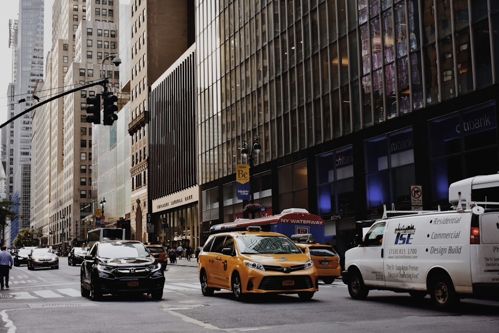 cars on road in city during daytime