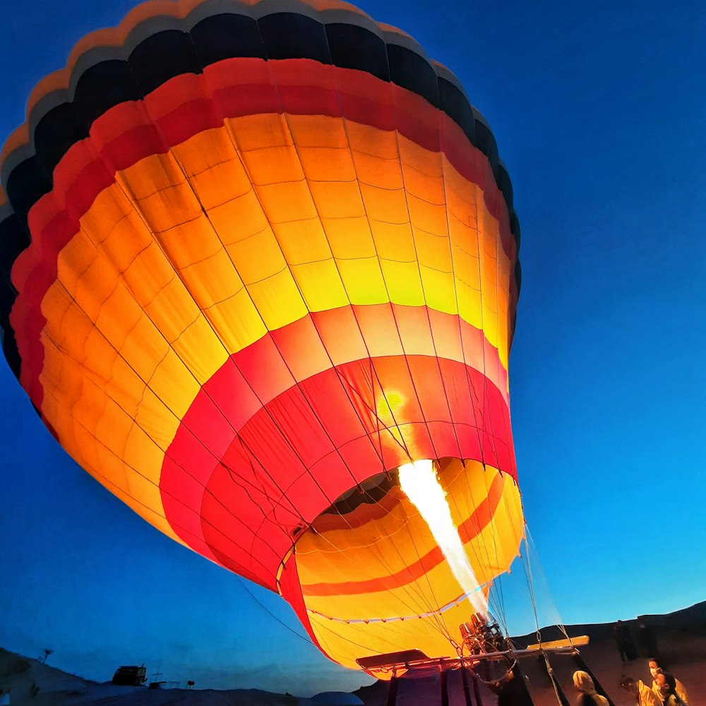 orange hot air balloon during night time