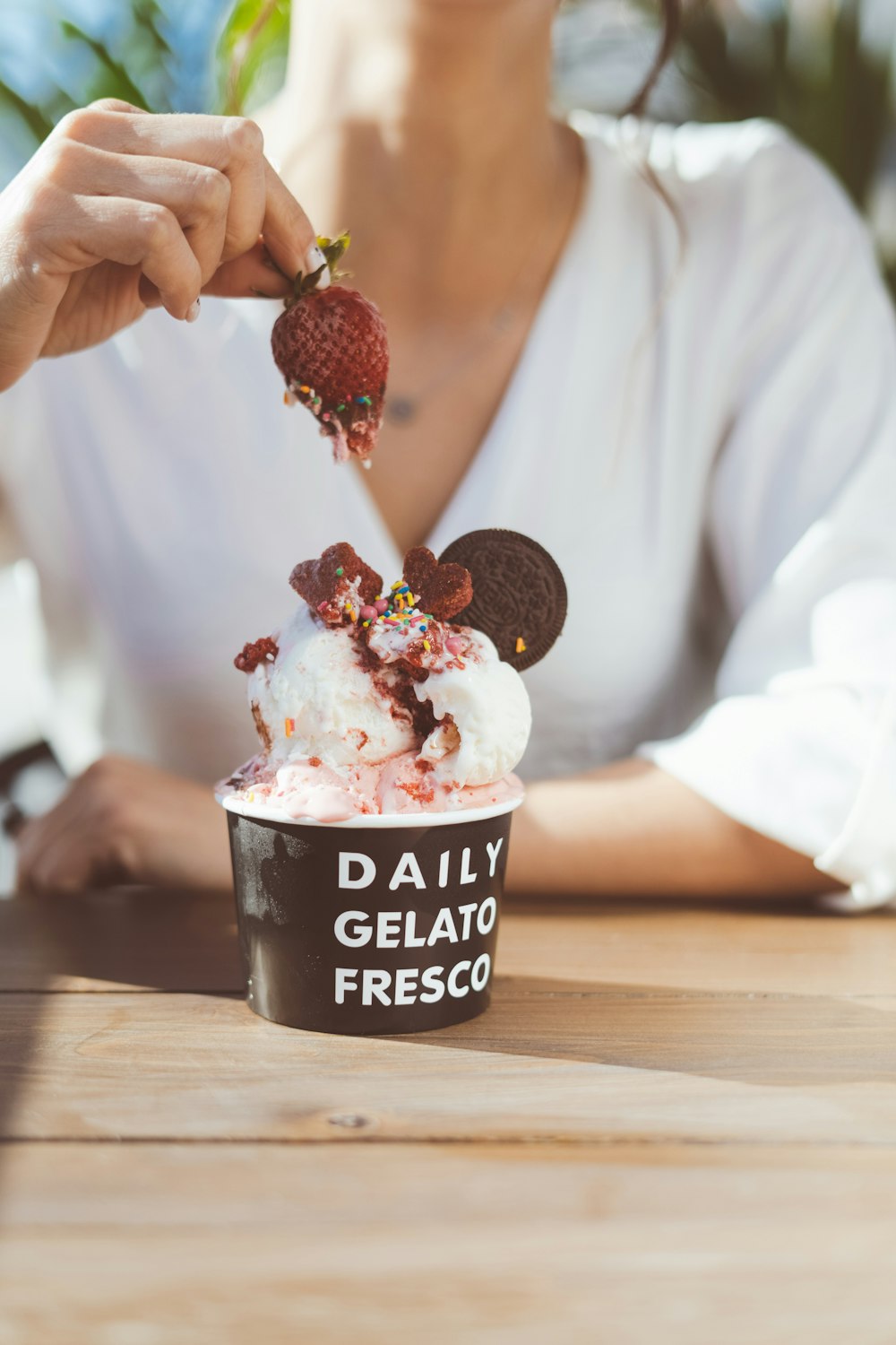 ice cream with strawberry on top