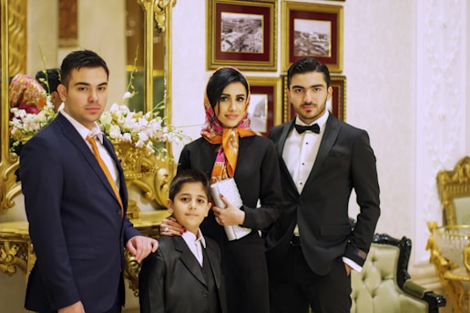 group of people wearing black suit