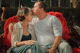 man in white crew neck t-shirt kissing woman in white long sleeve shirt