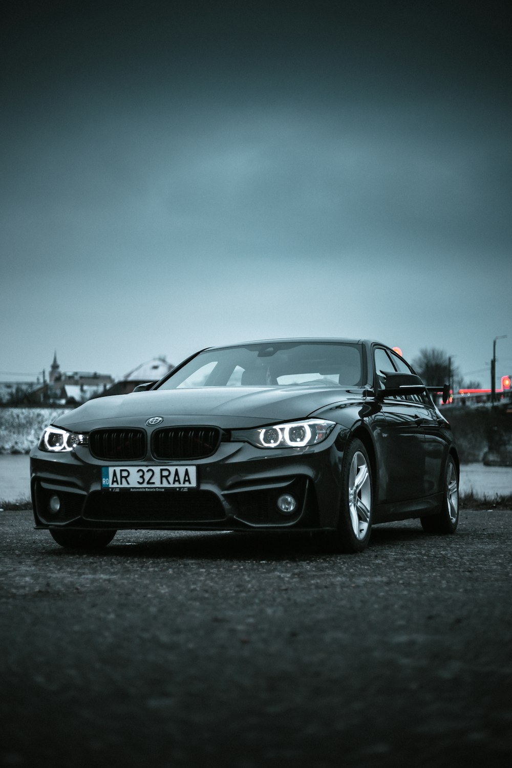 black bmw m 3 on road