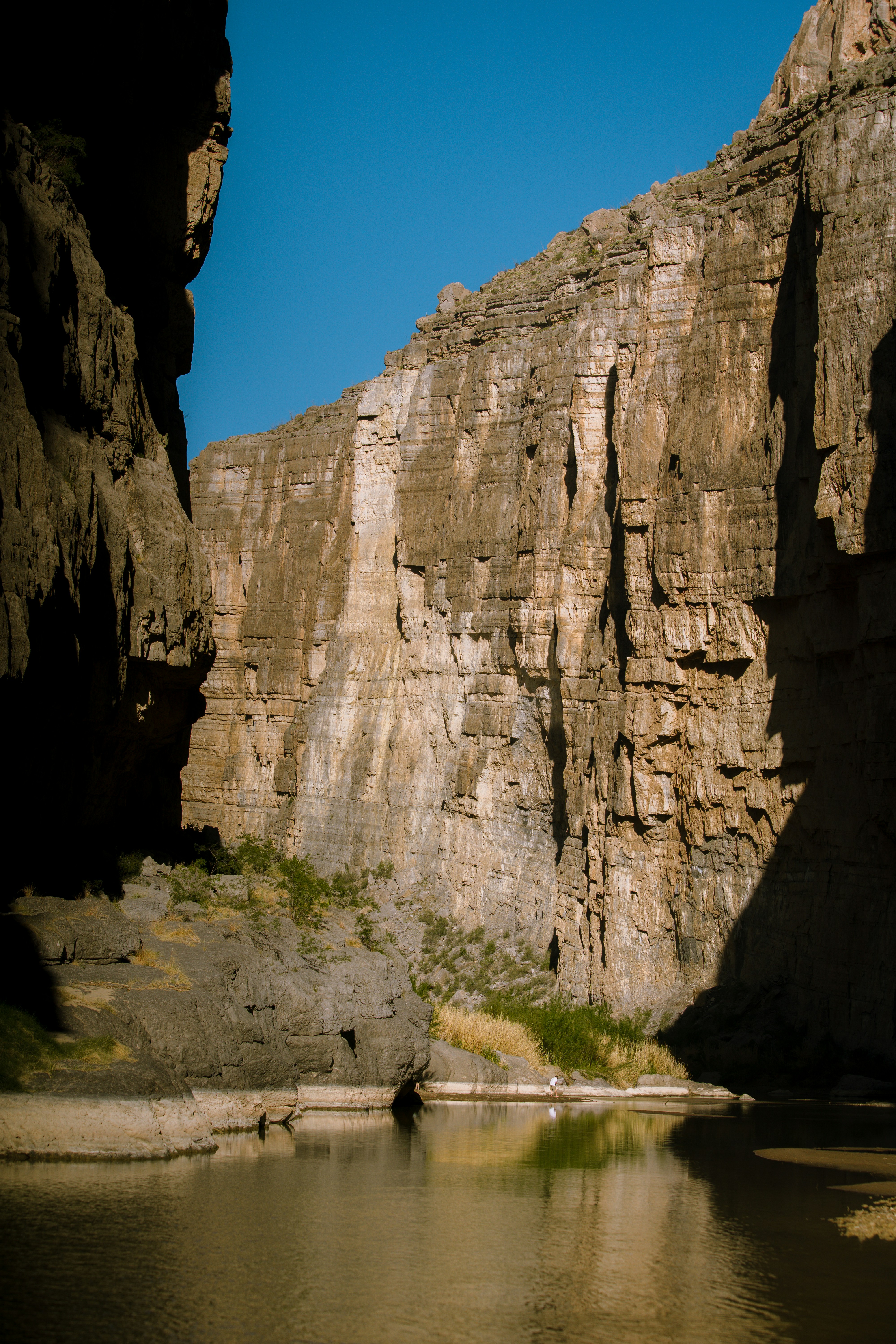 brown rocky mountain under blue sky during daytime