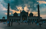 A panoramic shot of the Grand Mosque filled with worshippers.