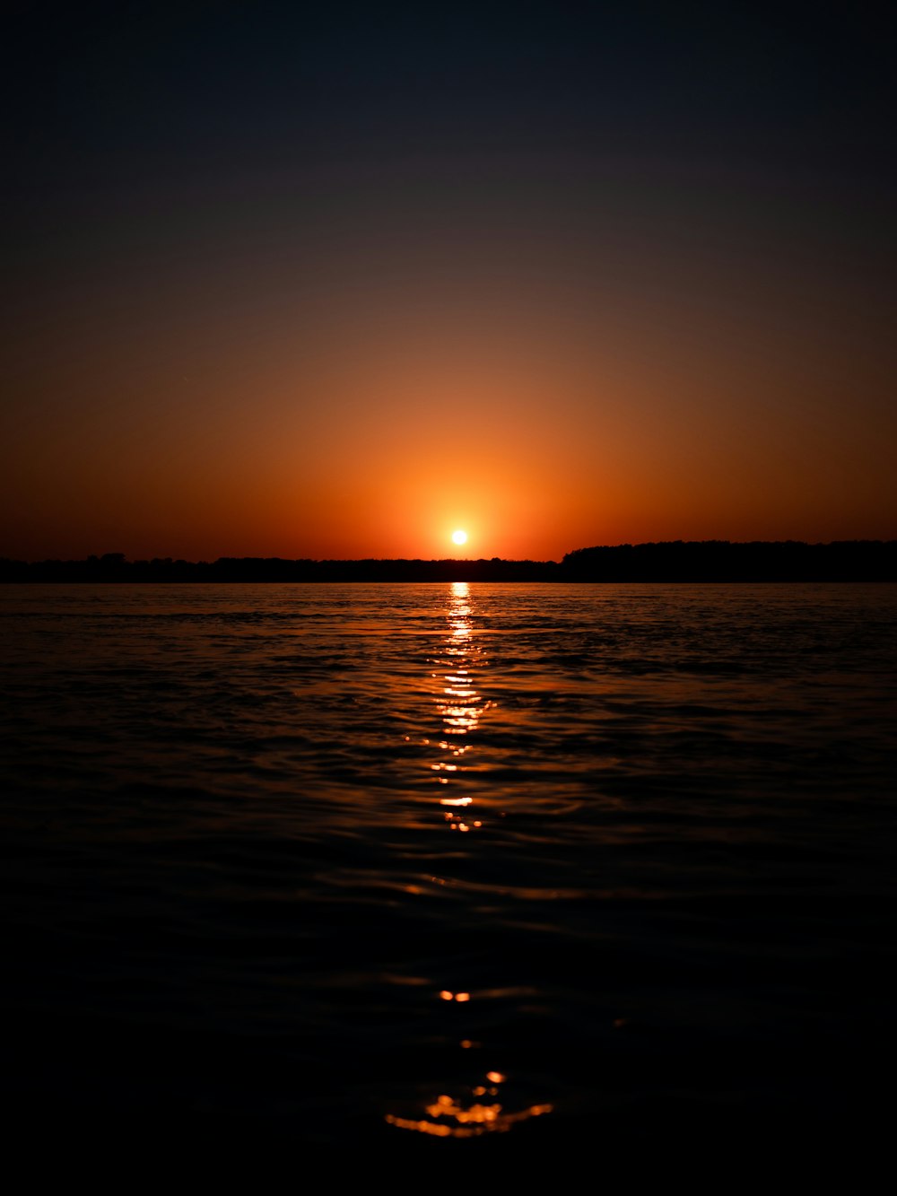 silhouette of mountain during sunset