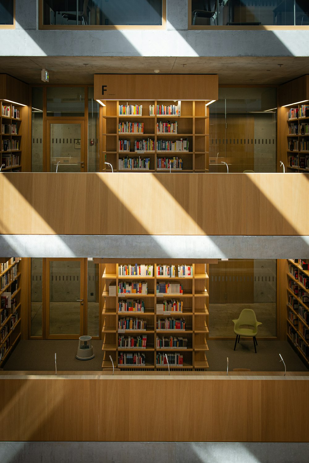 brown wooden book shelf with books