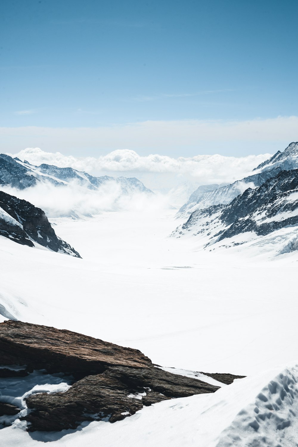 snow covered mountain during daytime