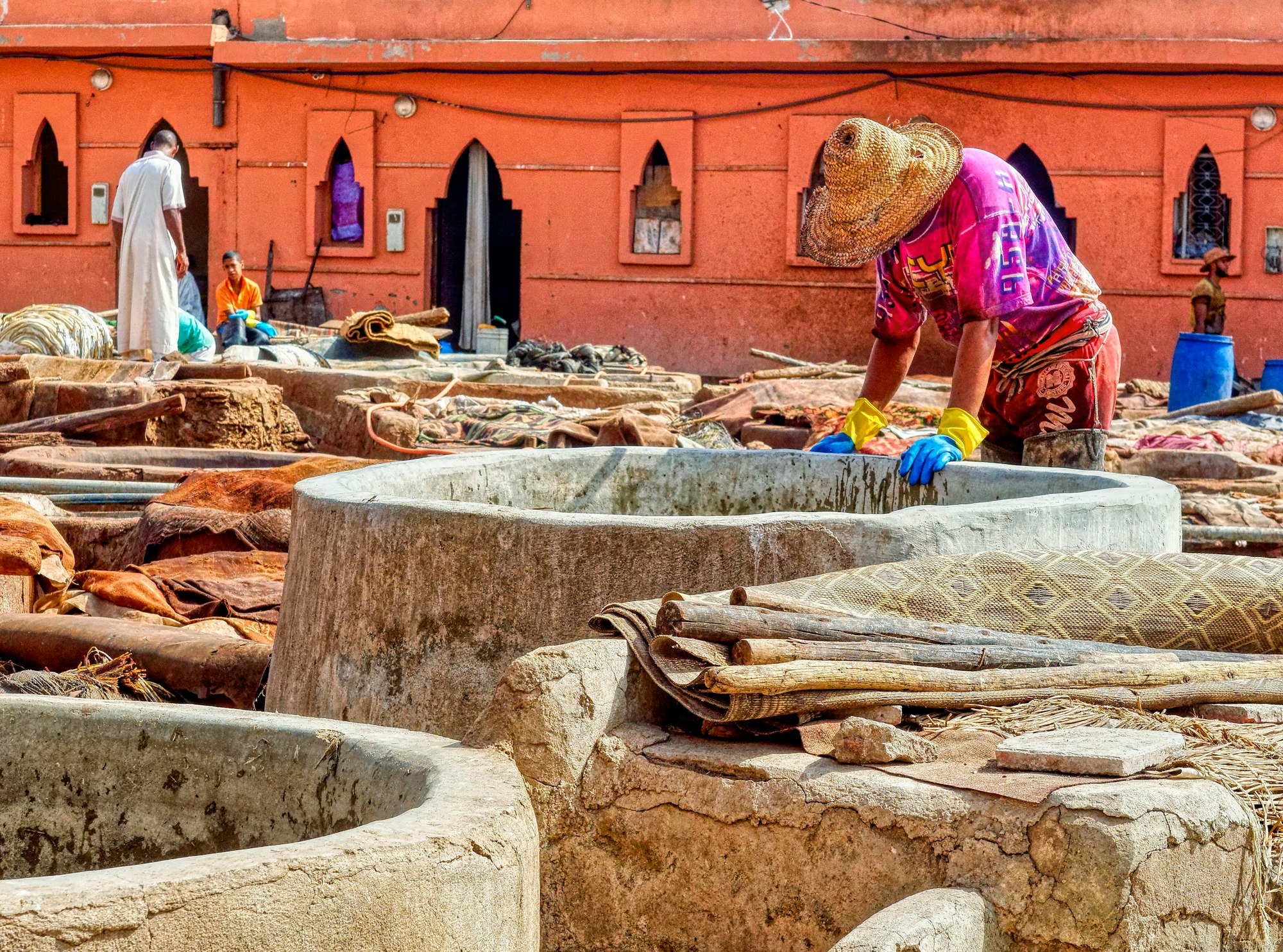 Worker at a tannery in Morocco.
A visit to a Moroccan tannery is not only a visual impression that stays, also the smell is unforgettable. The procedure of making leather has not changed much over the last decades and even centuries, neither have the working conditions, we were told. In Marrakesh the tannery is an enterprise run by about 50 families. The reputation of Moroccan leather was so great that the French word "maroquinerie" has become the general term for everything made from leather. 