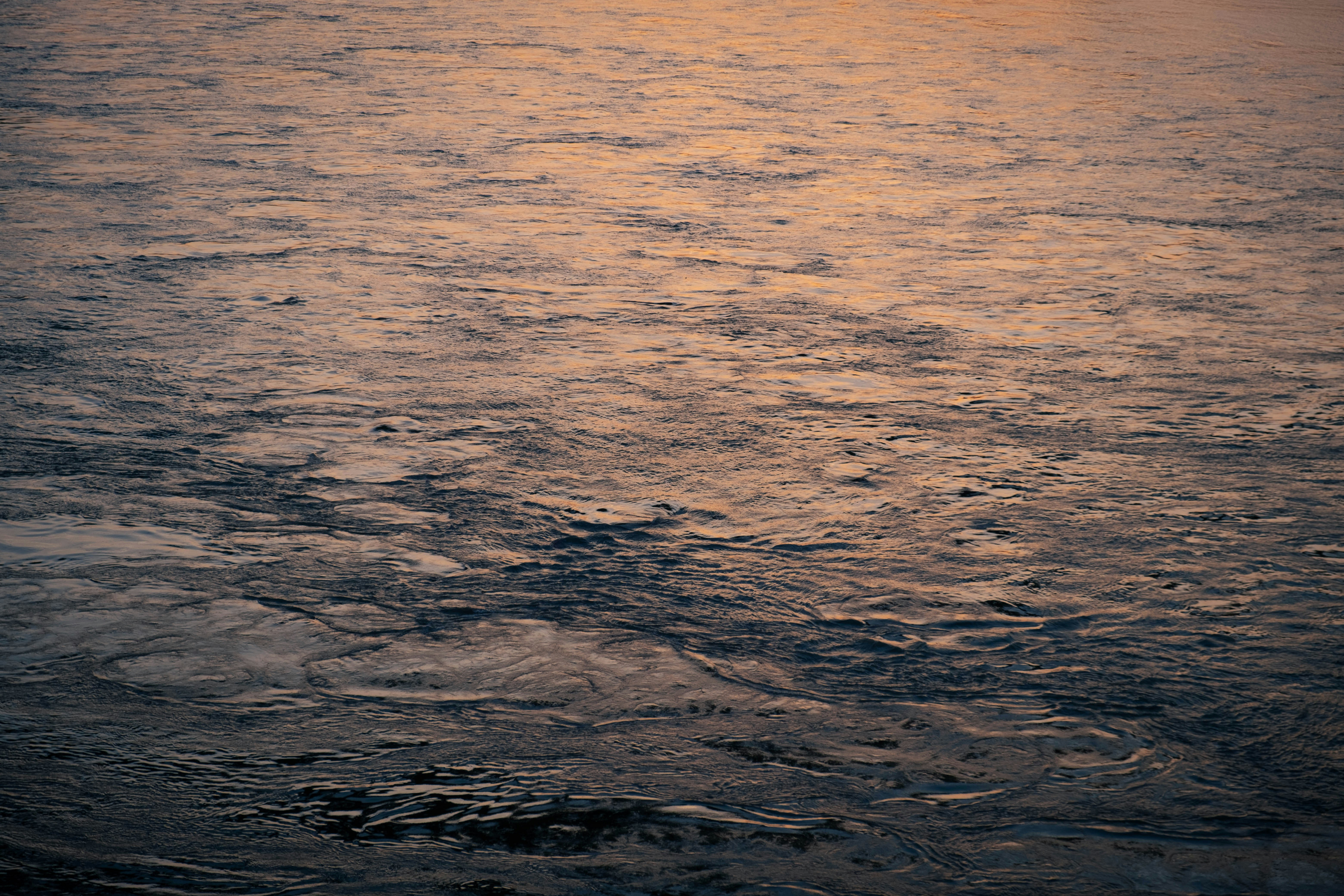 blue ocean water during daytime