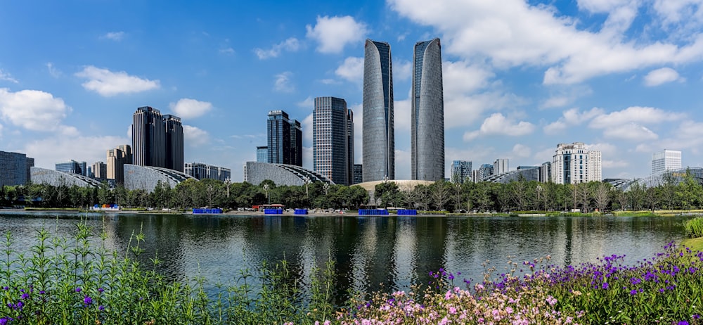 body of water near city buildings during daytime