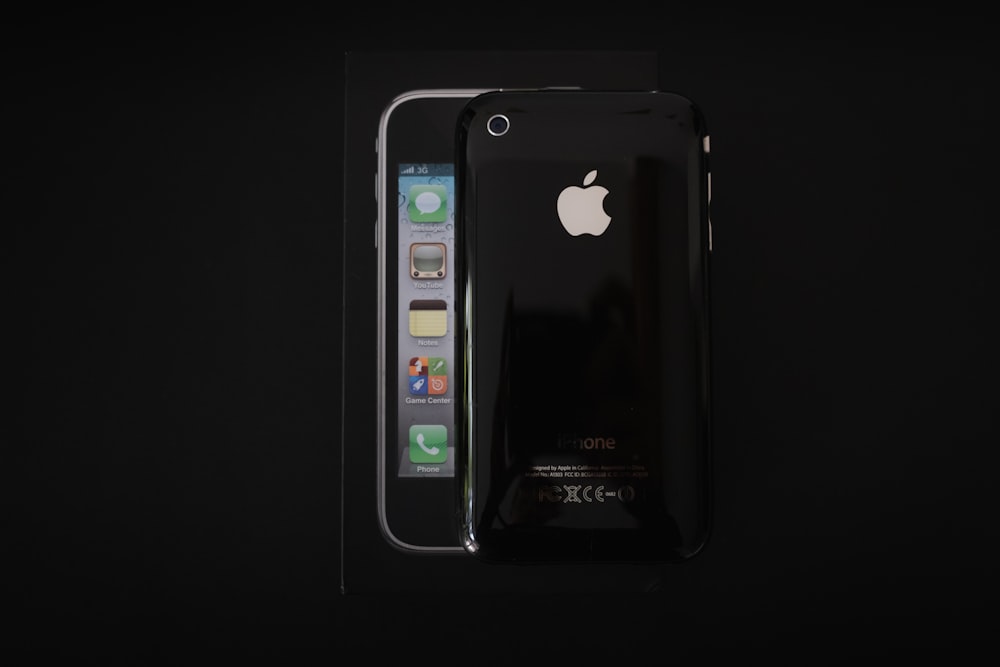 silver iphone 6 on black background