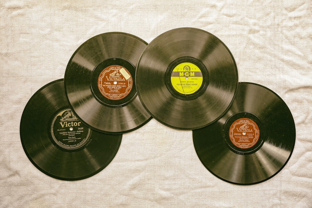 black vinyl record on white textile