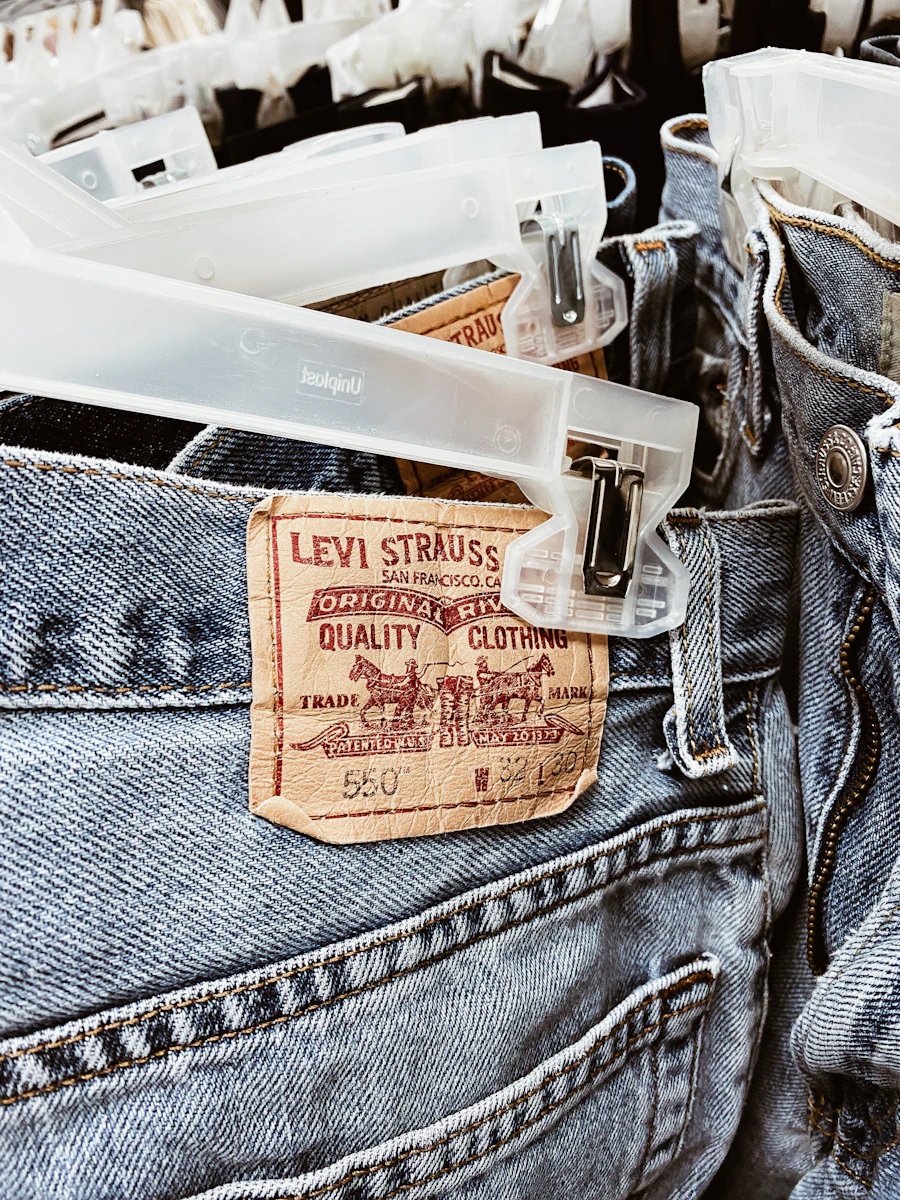 Stitching detail on denim with a leather label