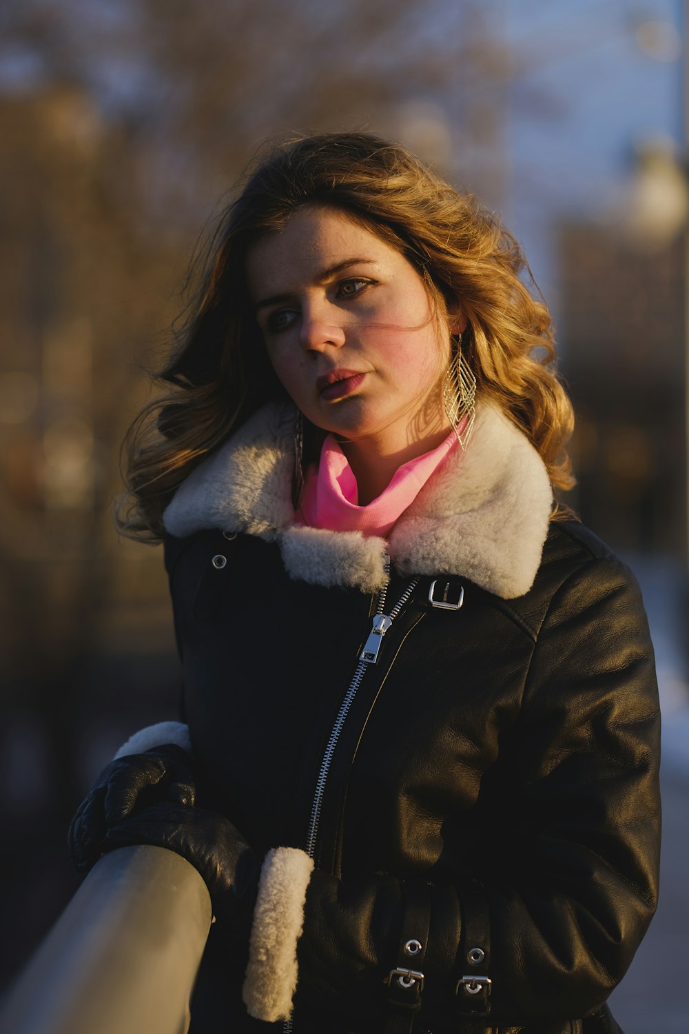 woman in black jacket smiling