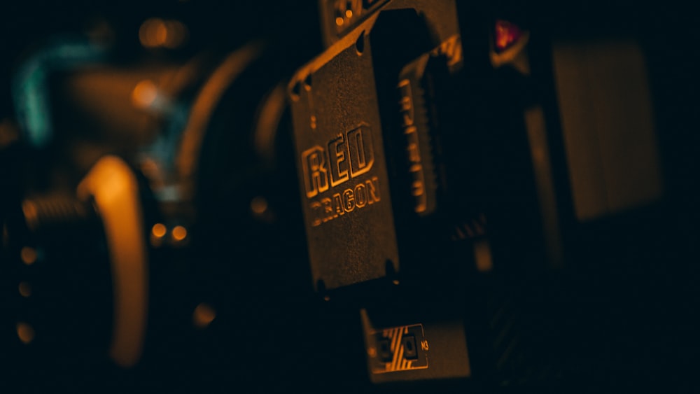 a close up of a street sign in the dark