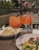 Guests enjoying an apericena with smiles and laughter.