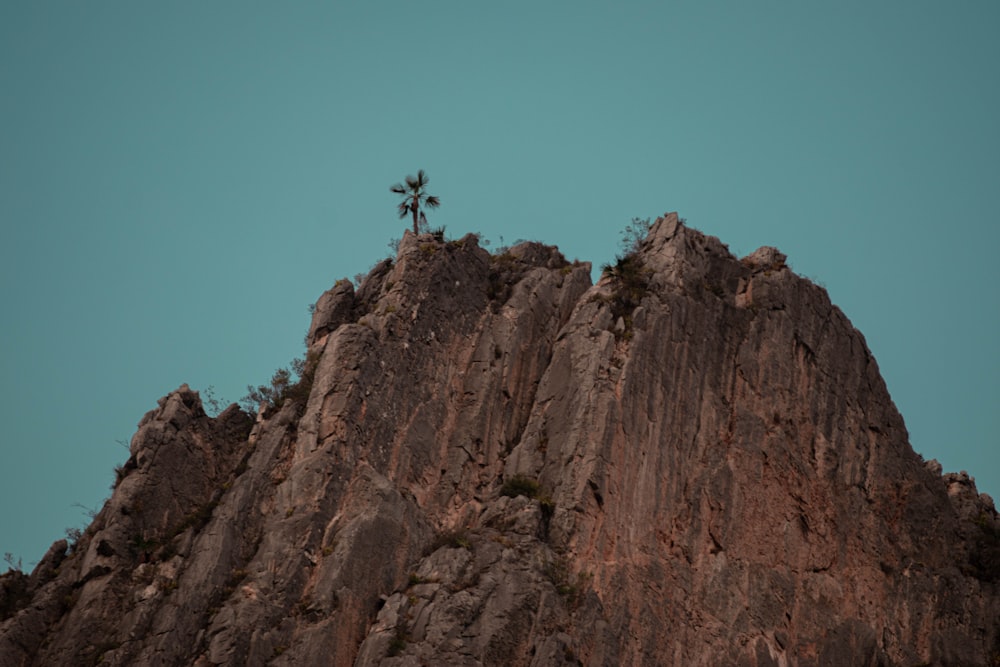 brown rock formation under blue sky during daytime