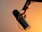 black and silver microphone on brown wall