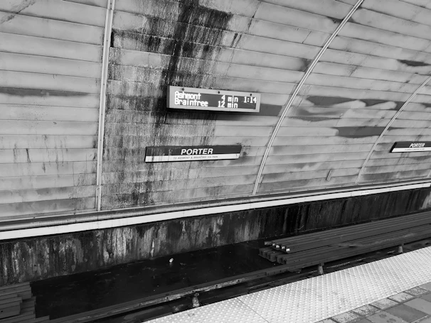Historic Boston subway station with vintage signage, evoking the city's rich transit history.