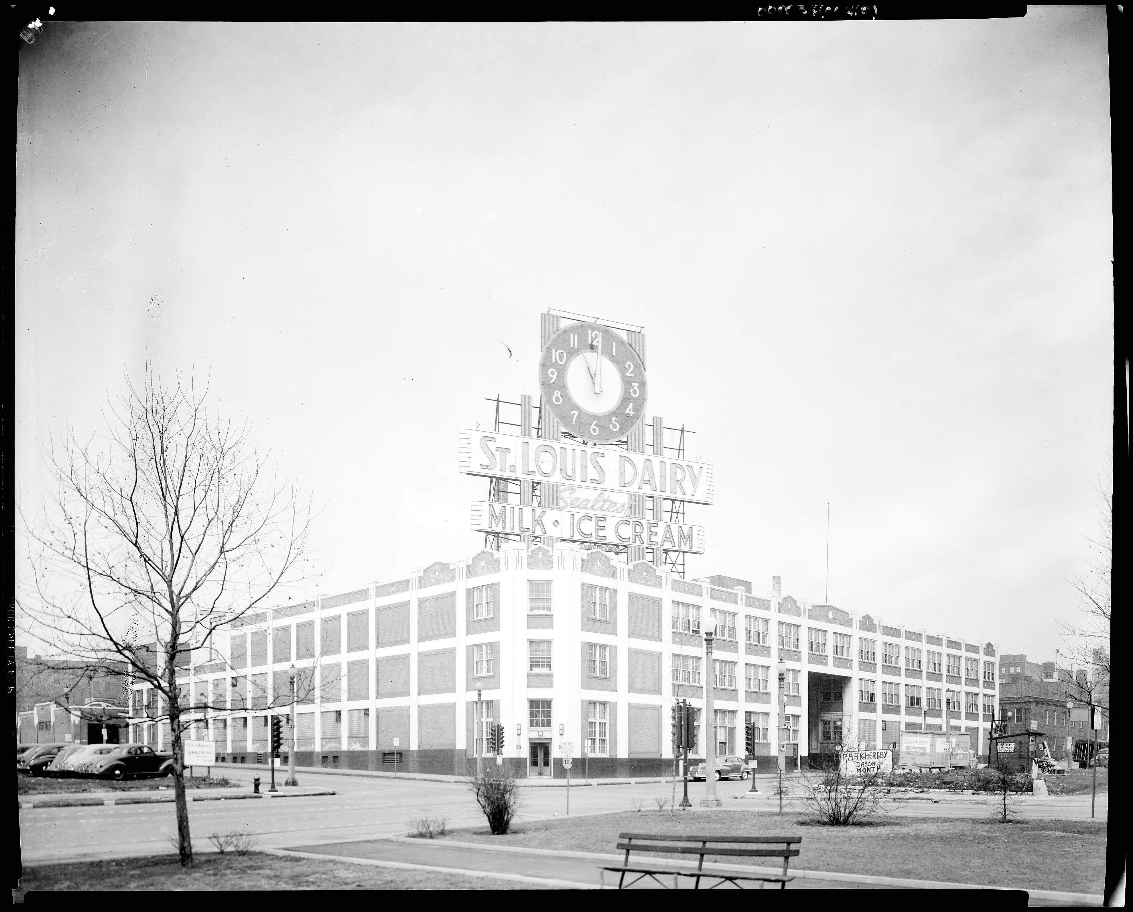 St. louis dairy building with large clock sign