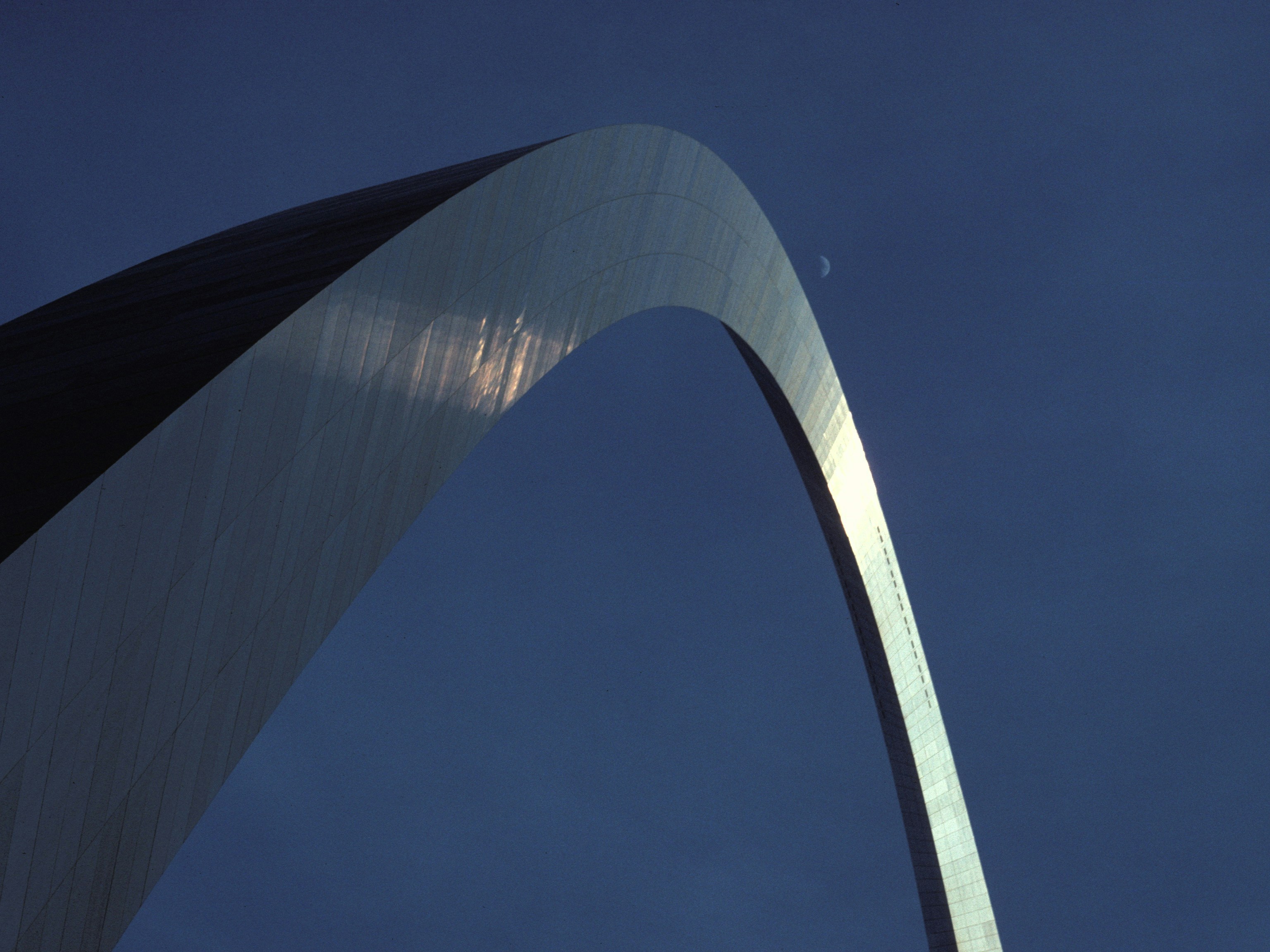 Gateway arch against a dark blue sky