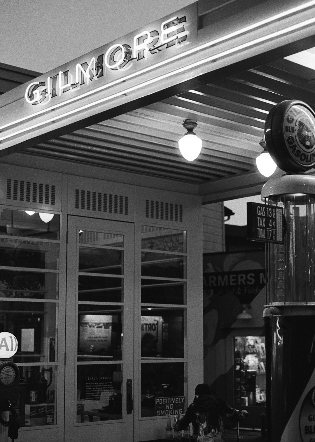 grayscale photo of store front