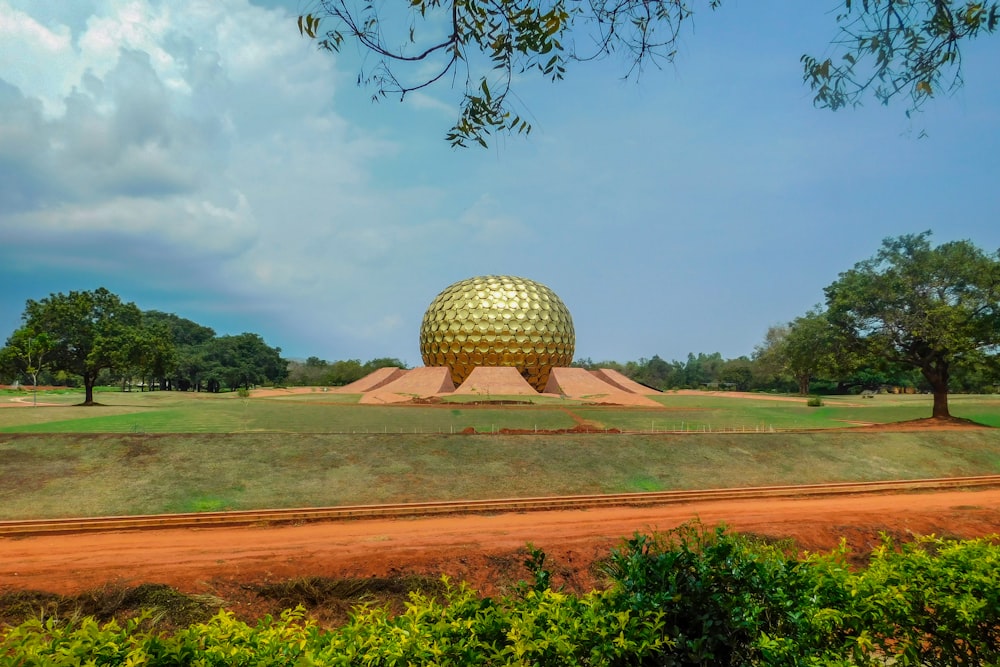 white ball on brown field during daytime