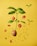 A potato plant is suspended in mid-air against a bright yellow background. The plant has green leaves and is accompanied by floating slices of tomato, pieces of red and yellow bell peppers, chopped green onion, and various spices and pepper flakes. The composition creates a dynamic and lively arrangement.