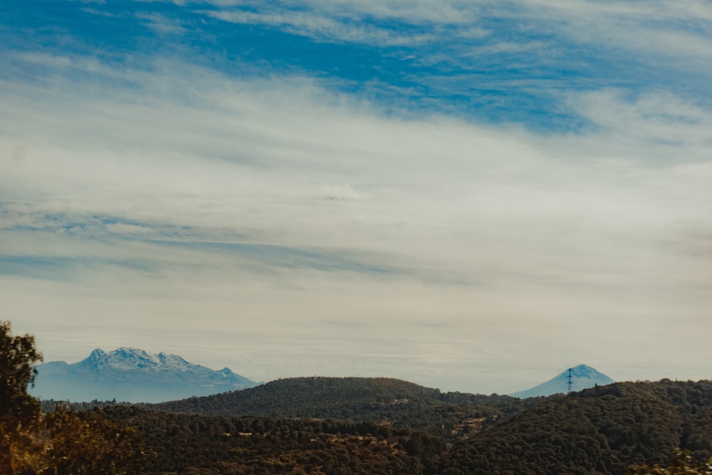 brown mountains under blue sky during daytime