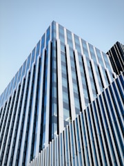 A modern building exterior with glass and steel design.