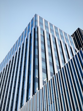 A modern building exterior with glass and steel design.
