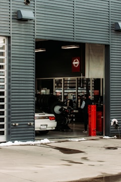 cars parked in front of building