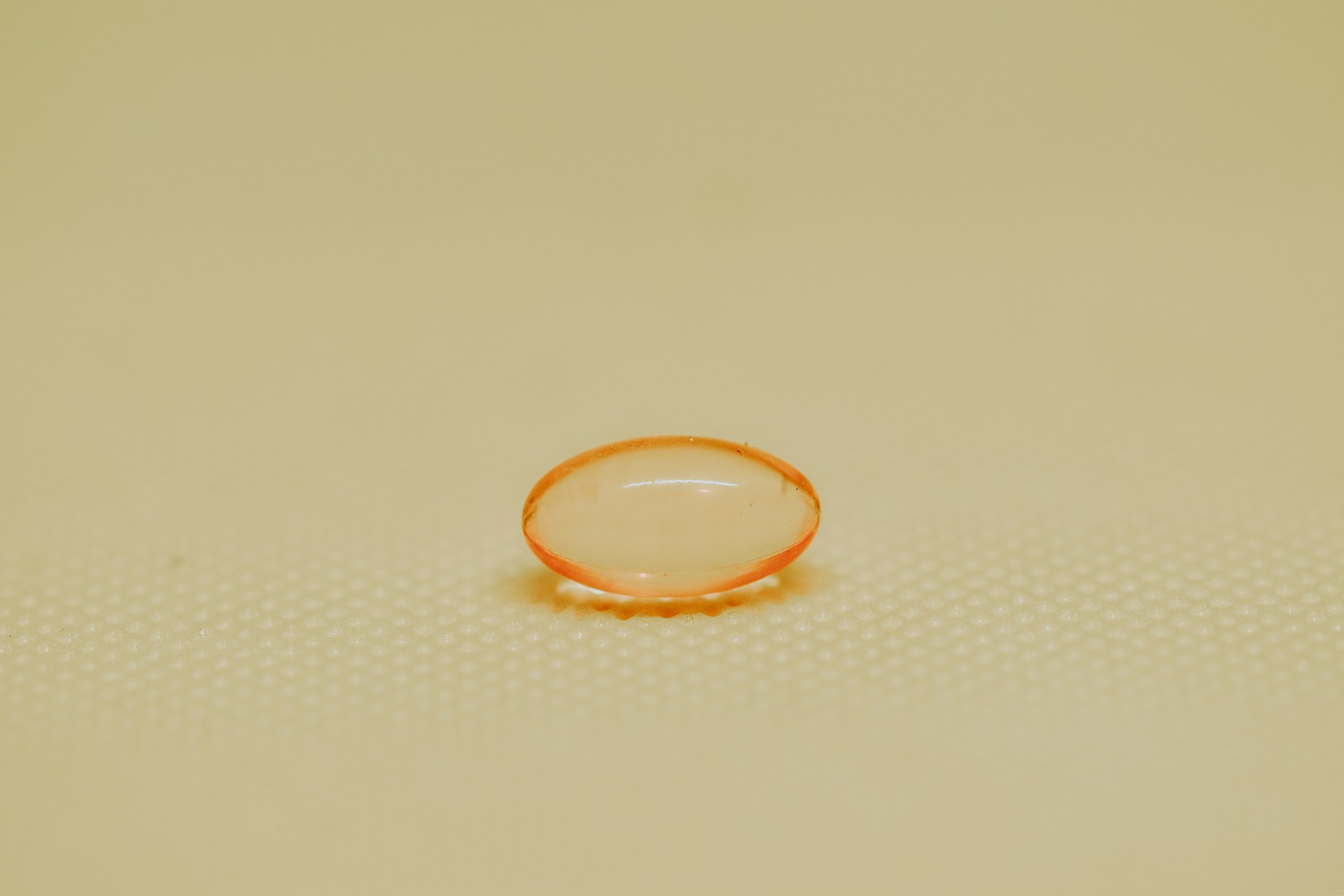 orange and white round ring