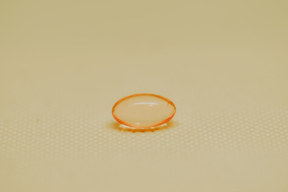 orange and white round ring