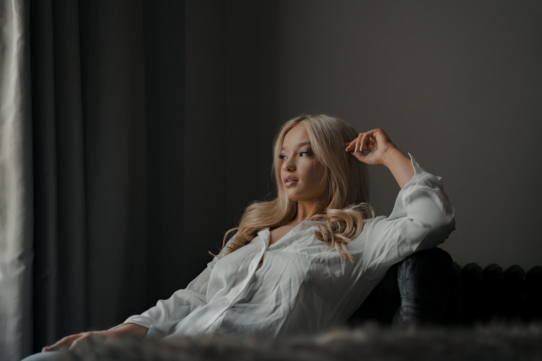 woman in white long sleeve shirt