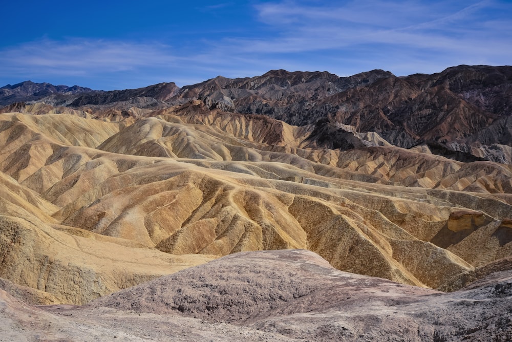 brown and gray mountains under blue sky during daytime