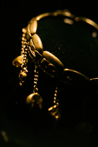 A stylish bracelet with intertwined chains showcased on a wrist against a neutral background.