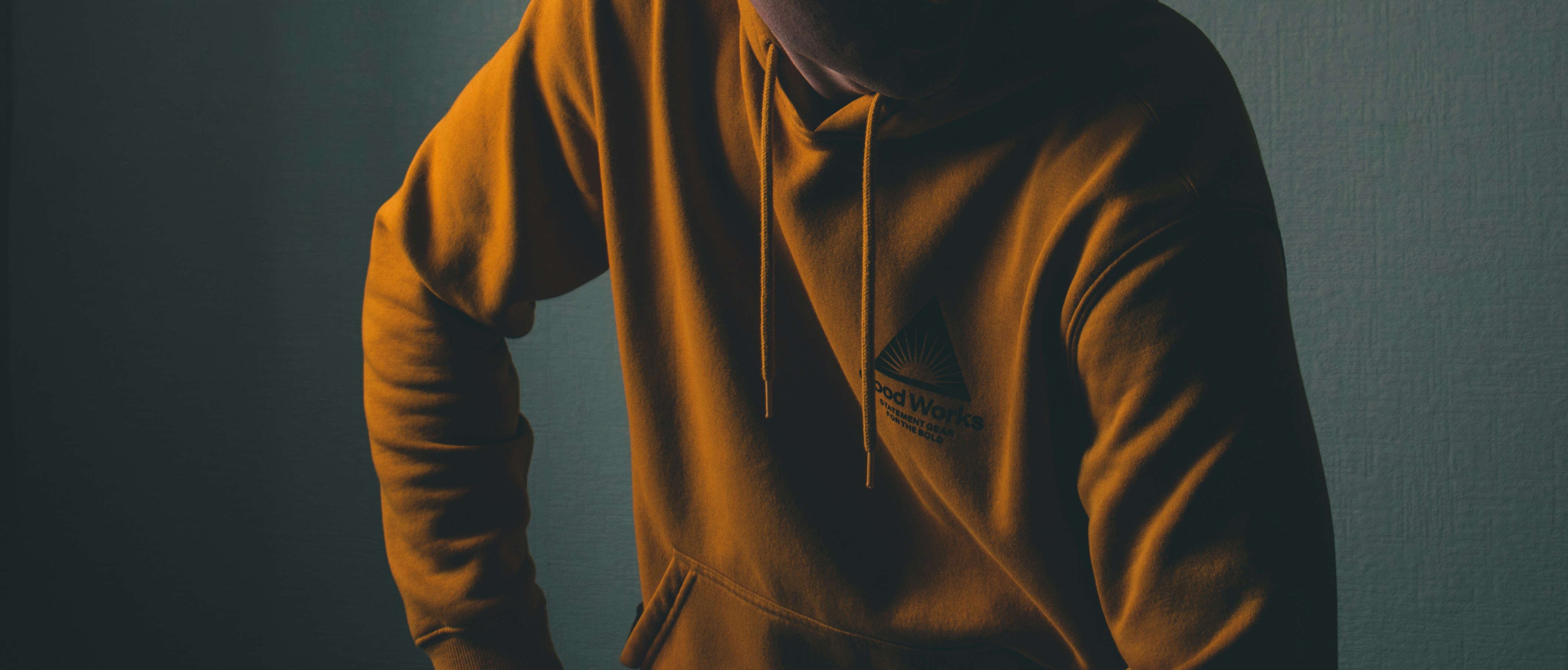 man in brown turtle neck long sleeve shirt