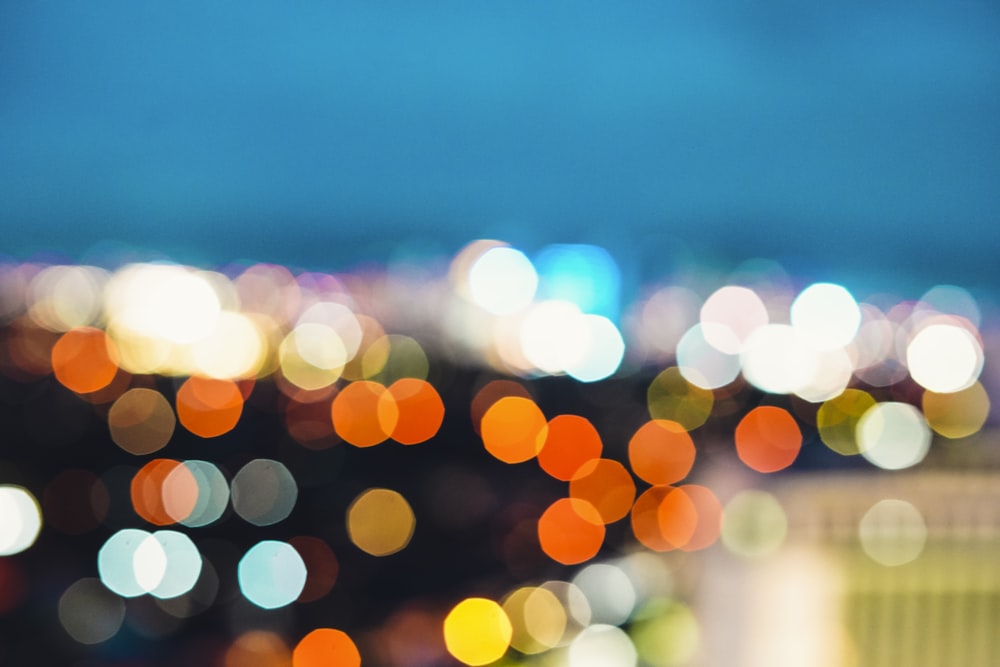 bokeh photography of city lights during night time