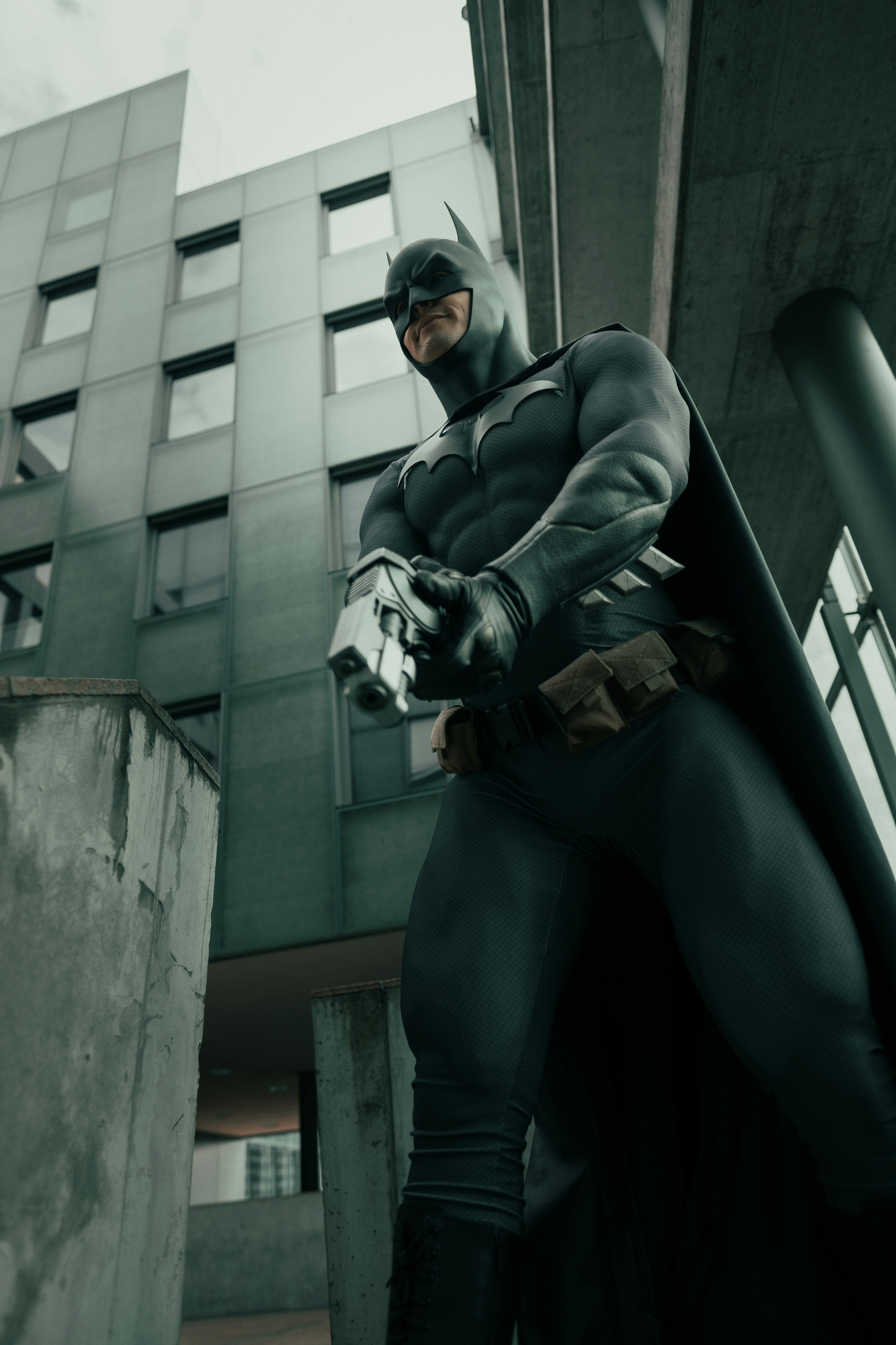 man in black jacket and blue denim jeans sitting on black bench