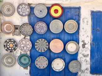 Traditional Murcian pottery displayed against a rustic wall