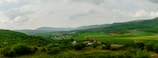 A panoramic view of lush green fields in Ireland.