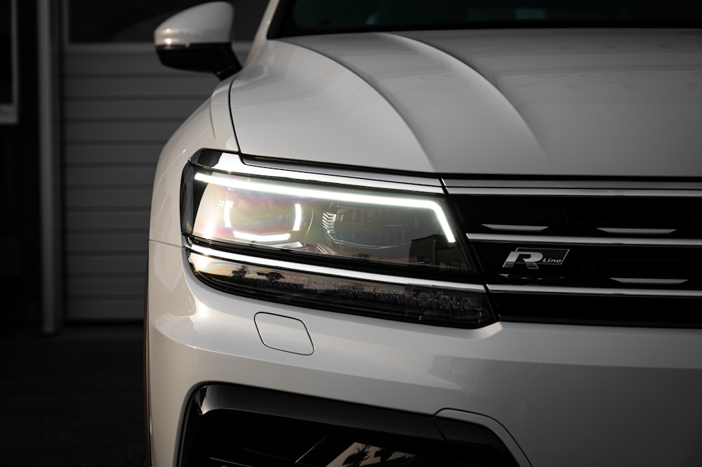 silver car with black and gray license plate